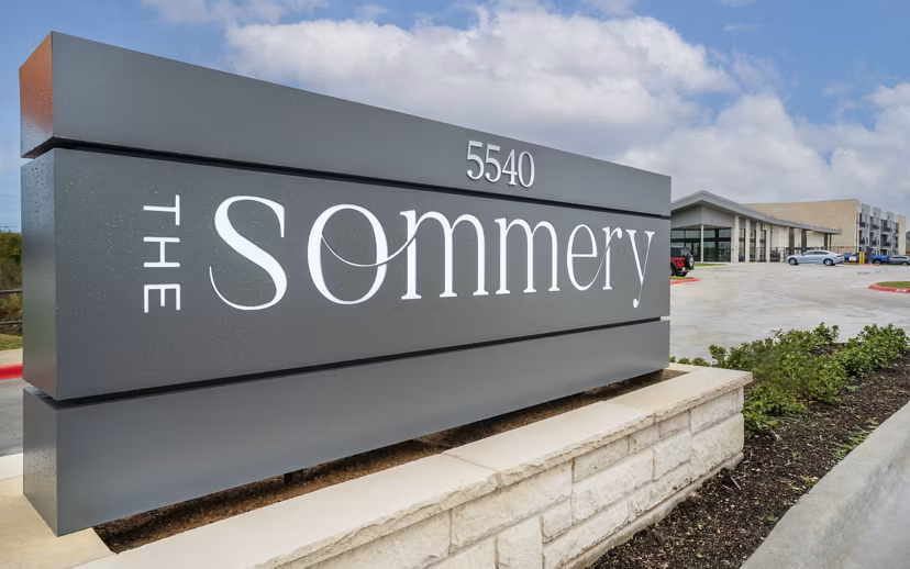 Cozy bedroom with modern decor at The Sommery Apartments
