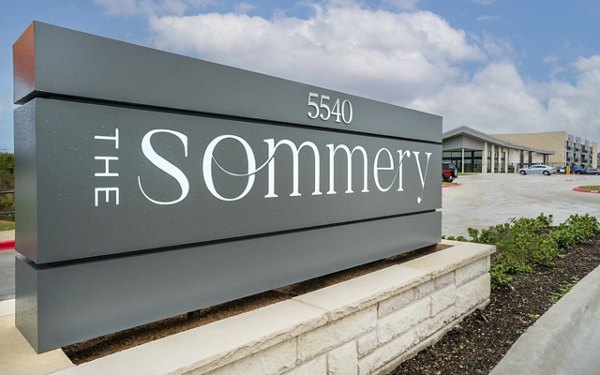 Cozy bedroom with modern decor at The Sommery Apartments