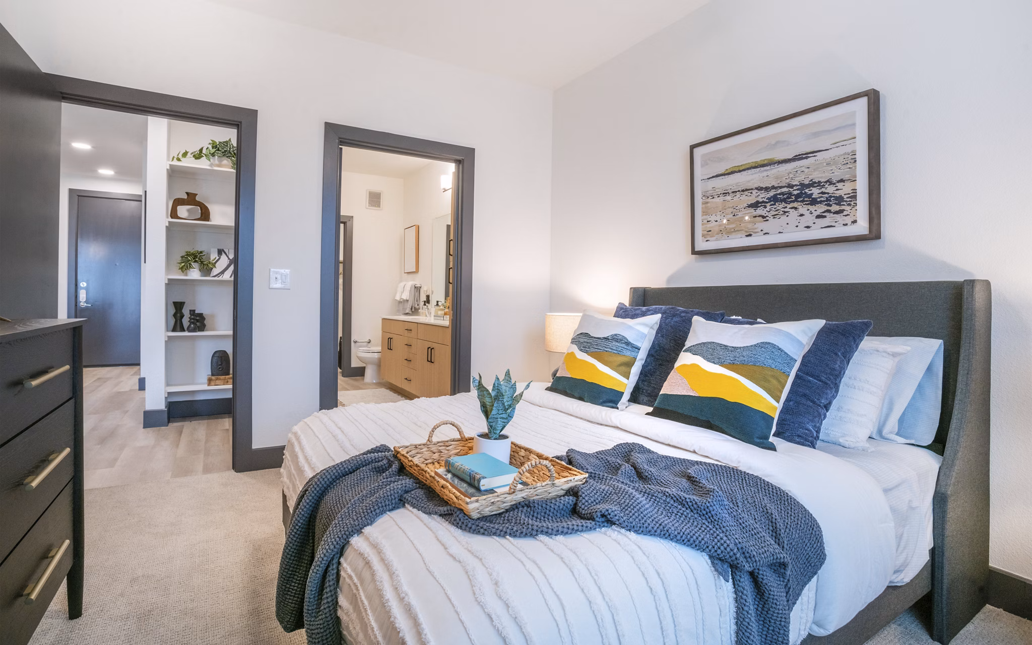 Cozy bedroom with modern decor in The Sommery Apartments