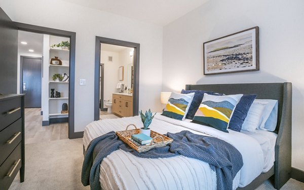 Cozy bedroom with modern decor in The Sommery Apartments