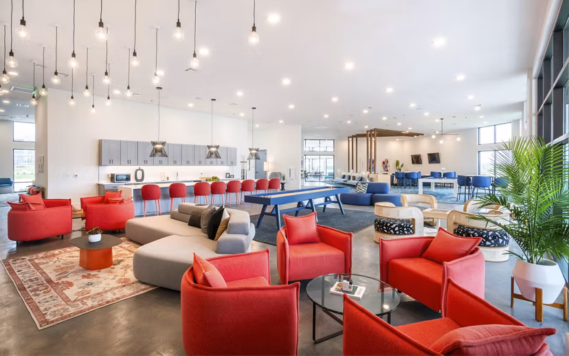Clubhouse with modern design and comfortable seating at The Sommery Apartments