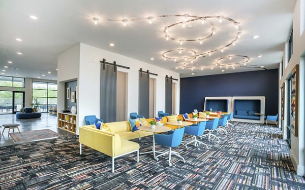 Clubhouse at The Sommery Apartments featuring stylish seating and modern decor for luxury living
