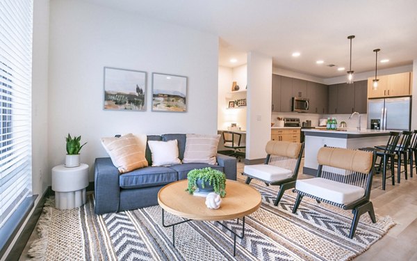 Living room featuring contemporary furniture and open layout at The Sommery Apartments, offering luxury living spaces