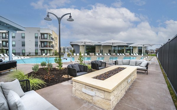 The Sommery Apartments: Cozy outdoor fire pit in luxury community