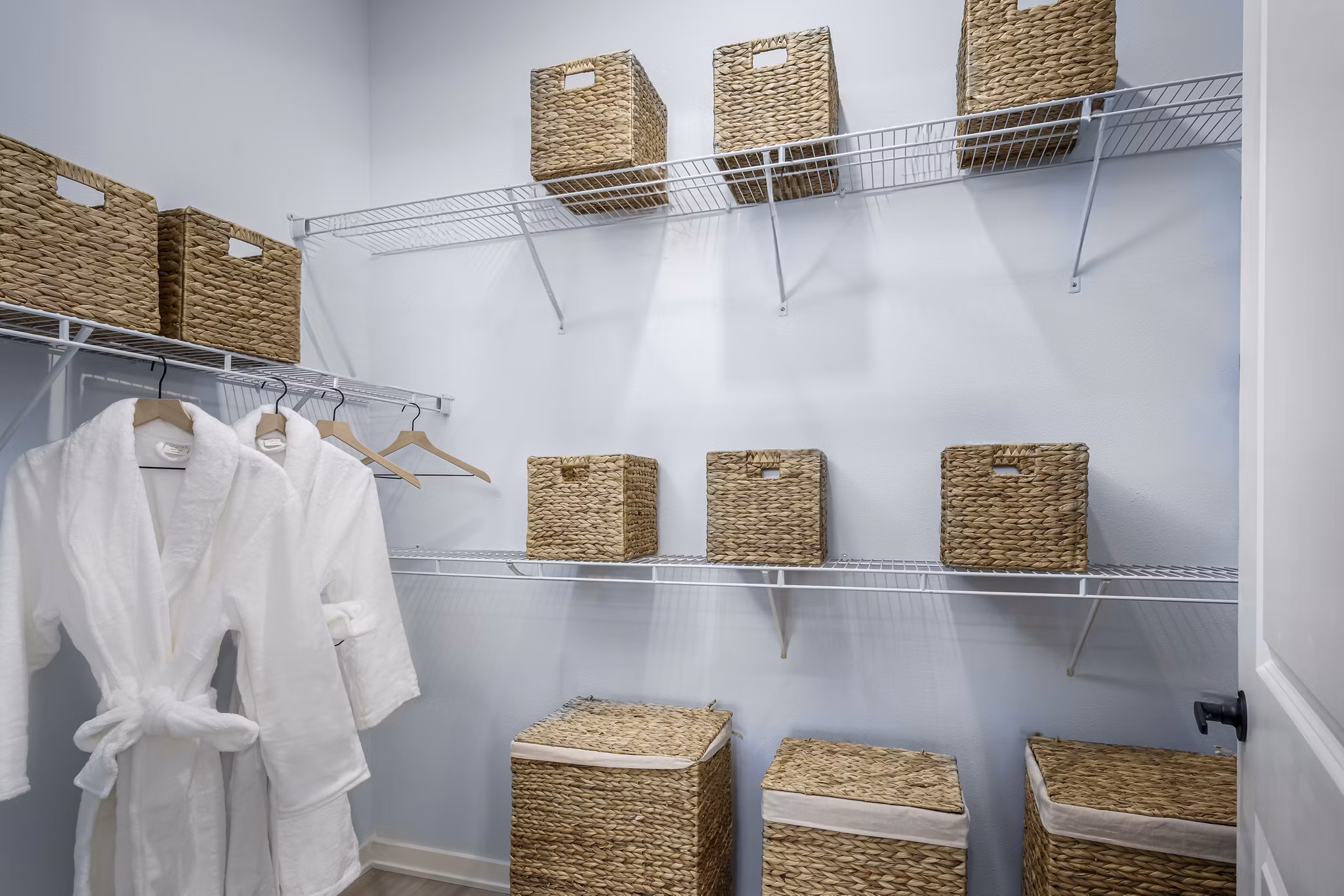 Spacious bedroom closet with custom shelving at The Elliott Apartments, offering ample storage in premium luxury apartments