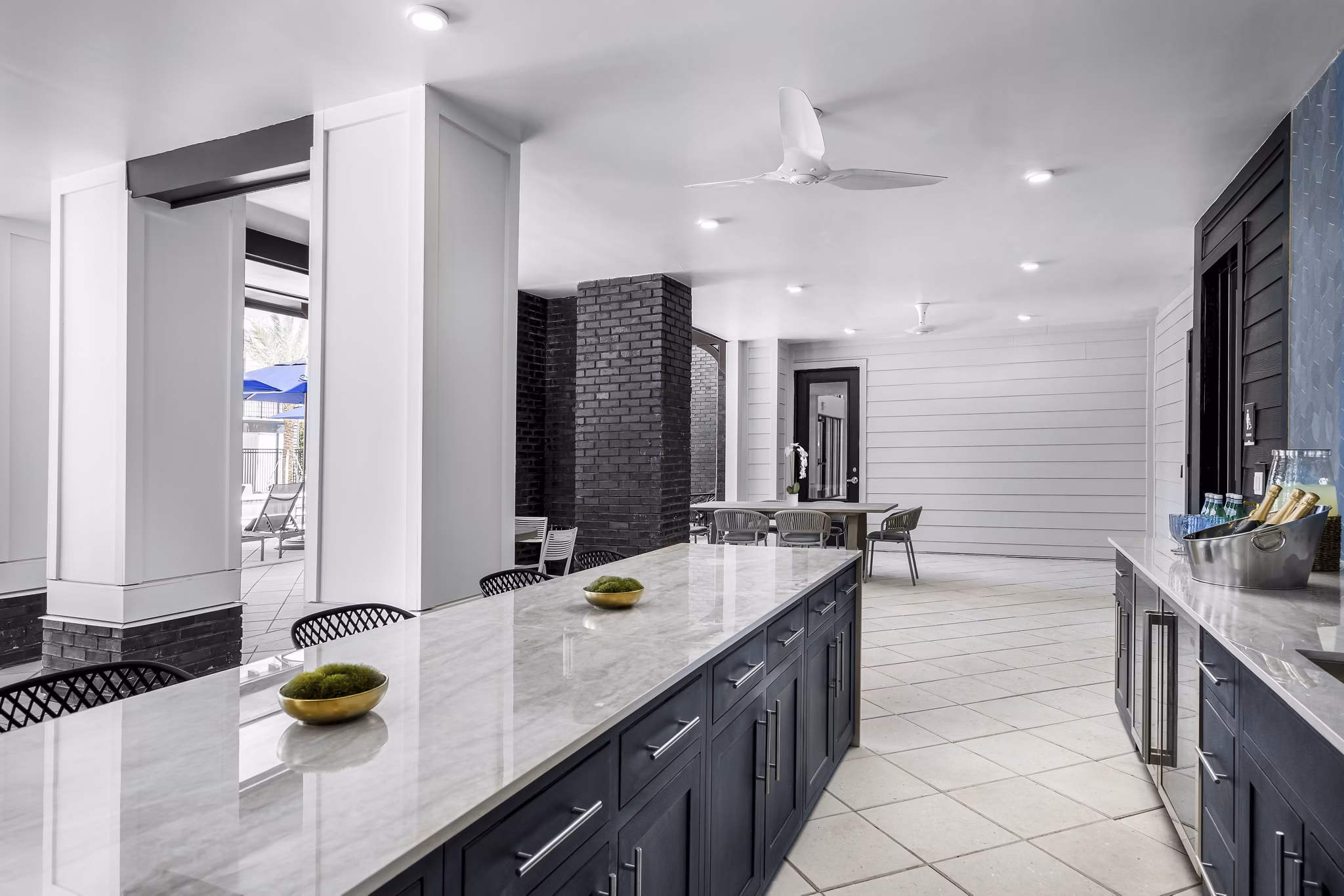 Clubhouse featuring modern design at The Elliott Apartments with seating and gathering spaces for residents