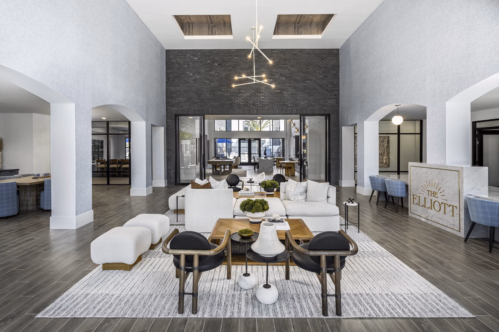 Clubhouse featuring modern design and community spaces at The Elliott Apartments