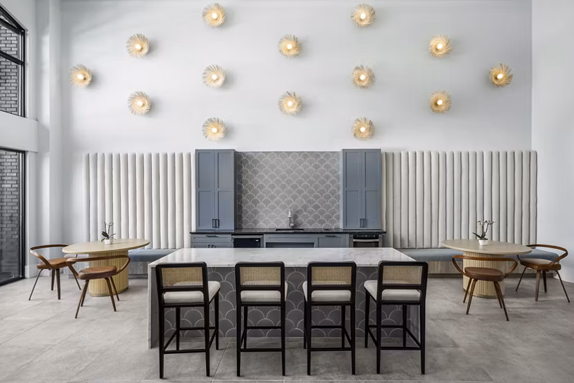 Clubhouse with modern seating and open spaces at The Elliott Apartments