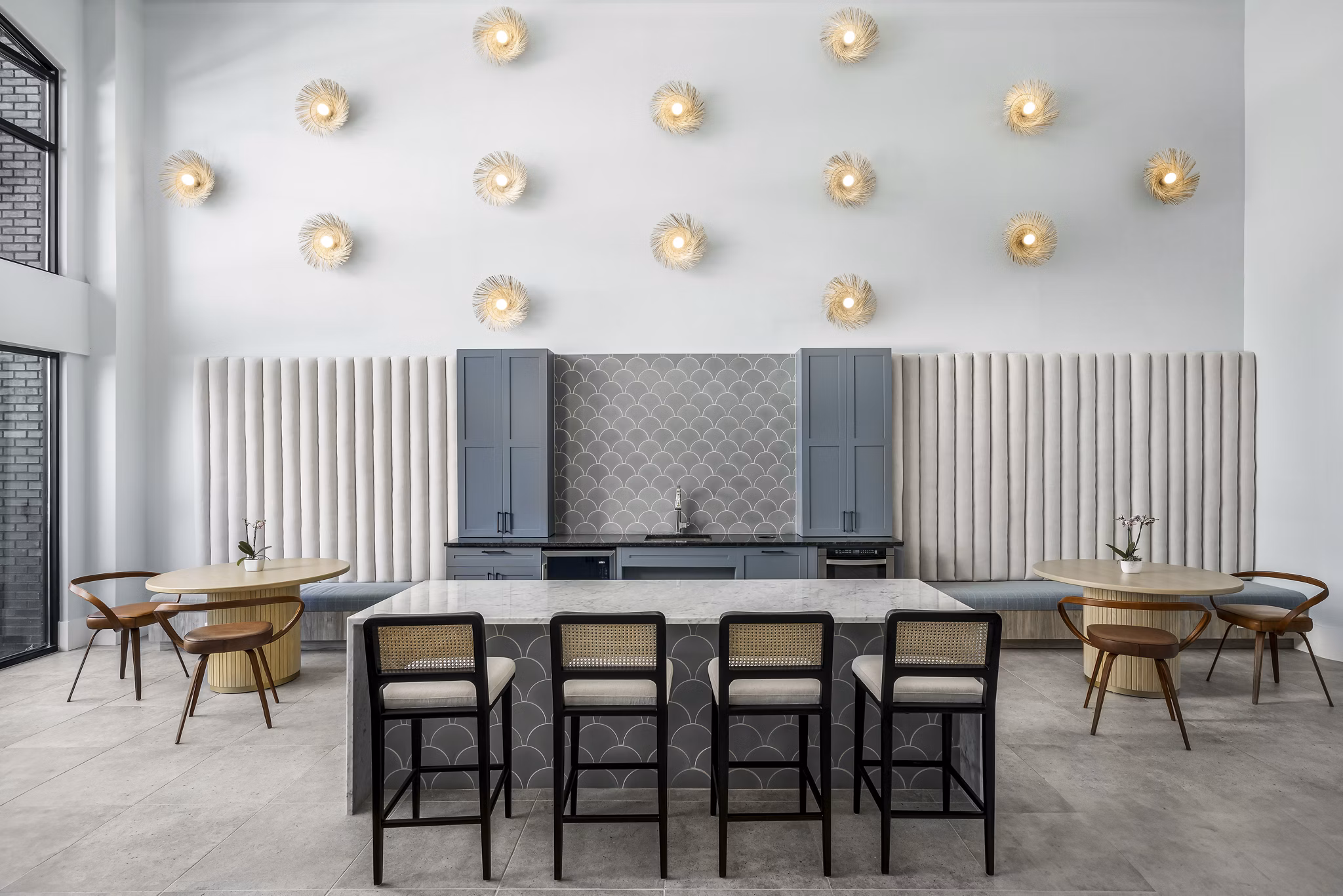 Clubhouse with modern seating and open spaces at The Elliott Apartments