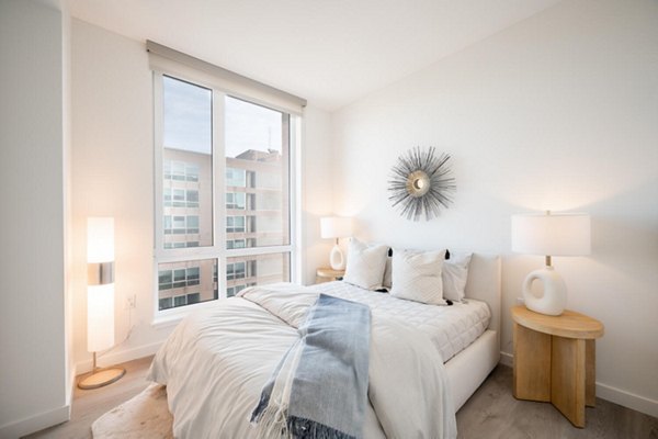 Bedroom with modern decor in Collection 14 Apartments