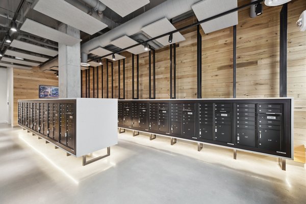 Mailroom with organized package lockers at Collection 14 luxury apartments in Greystar's vibrant urban complex