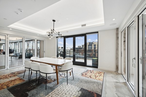 Clubhouse meeting facility with modern decor at Collection 14 Apartments