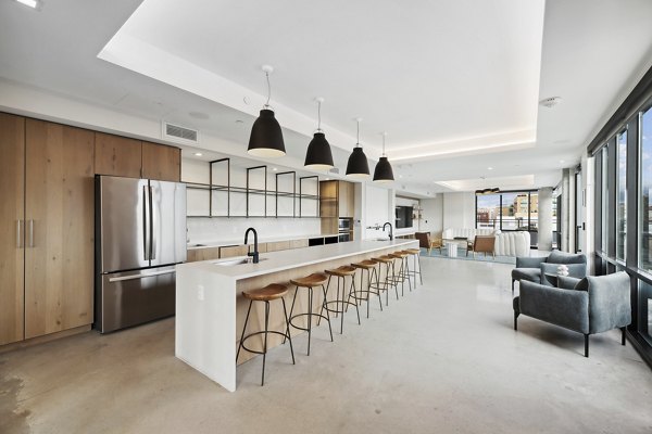 Stylish clubhouse with modern furnishings at Collection 14 Apartments in Greystar