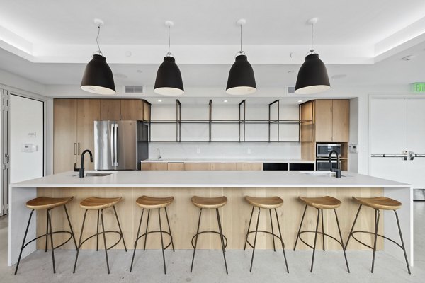 Clubhouse with modern design at Collection 14 Apartments, offering luxury amenities and social spaces for residents