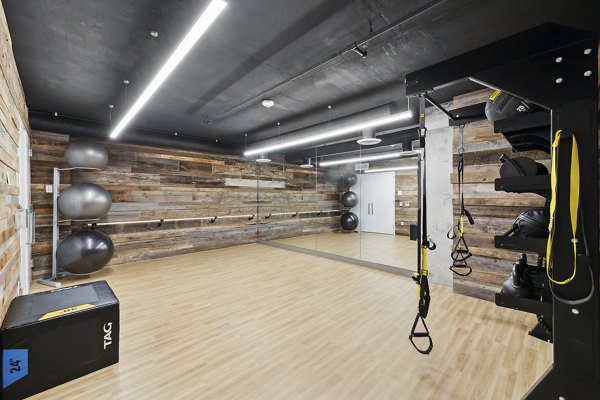 State-of-the-art fitness center with modern equipment at Collection 14 Apartments for an active lifestyle
