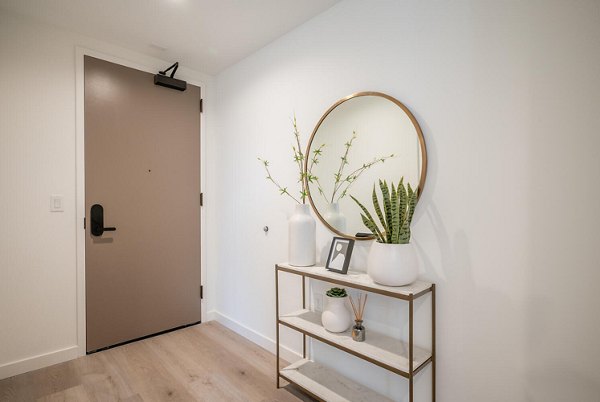 Spacious modern kitchen featuring stainless steel appliances in Collection 14 Apartments