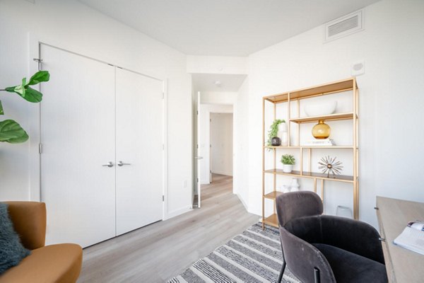 Modern home office with ergonomic desk and stylish decor in Collection 14 Apartments