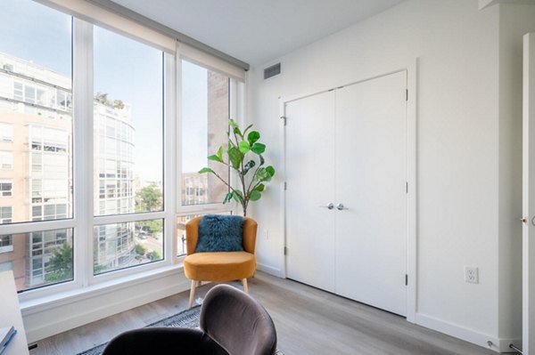 Home office with modern desk and shelving in Collection 14 Apartments in a stylish setting for productivity
