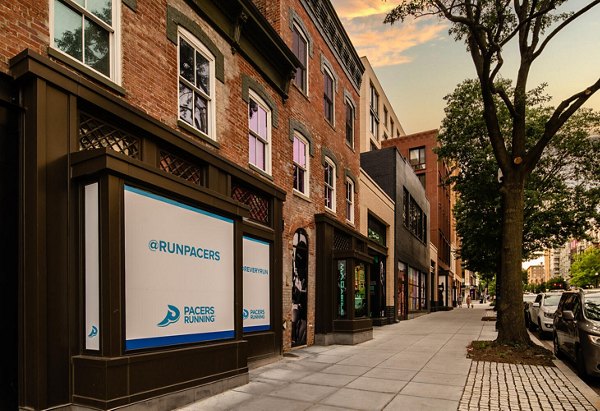 Vibrant neighborhood scene near Collection 14 Apartments showcasing local shops and cafes