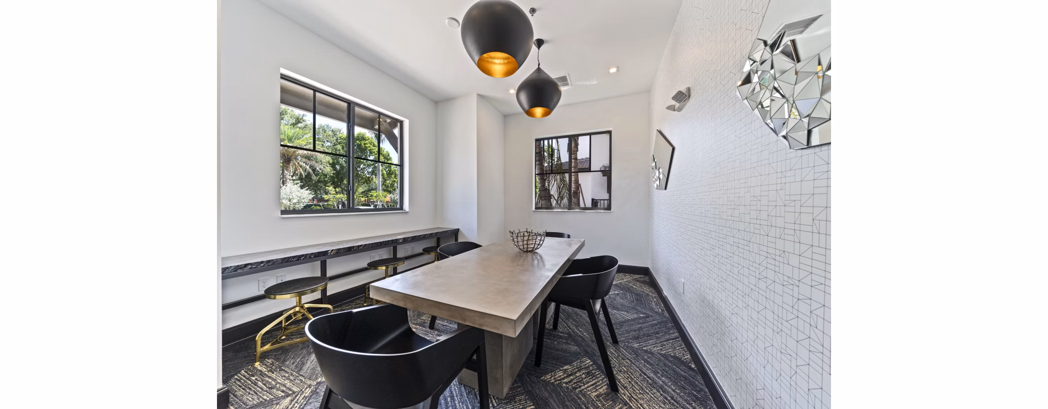 Modern meeting facility with ample seating and AV equipment at Ventura Pointe Apartments