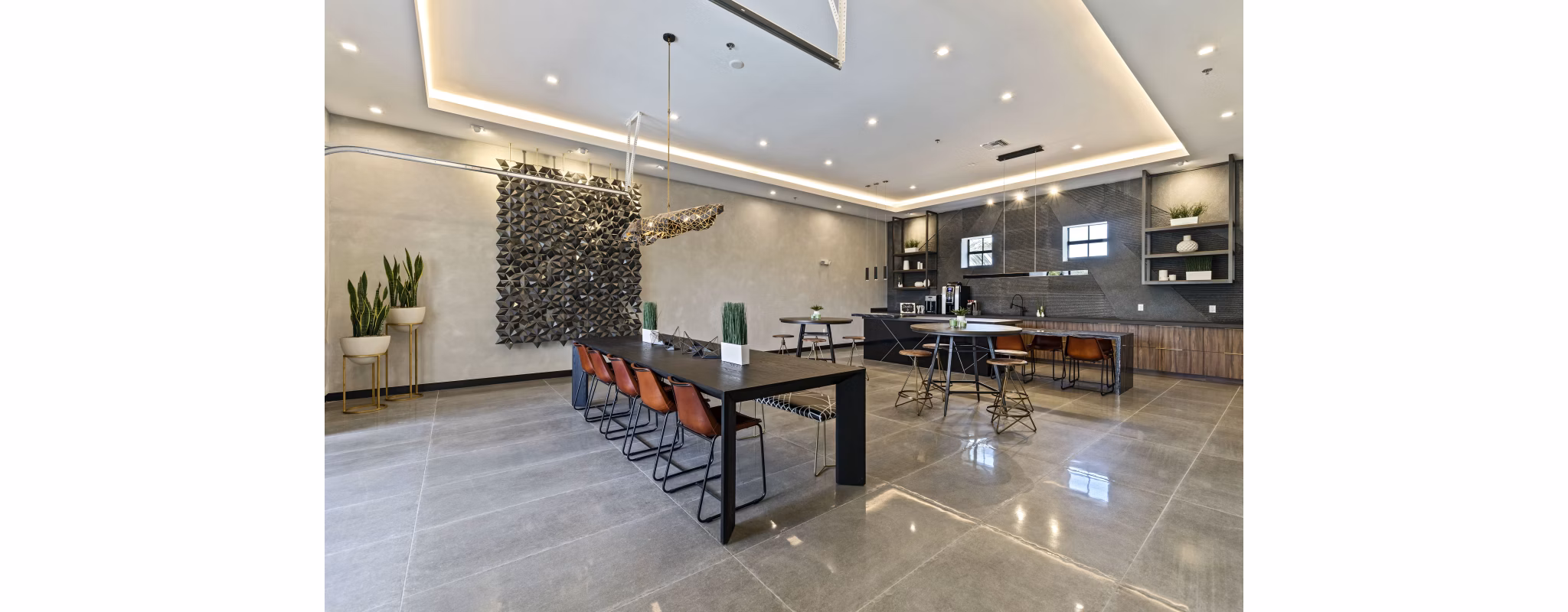Clubhouse with modern design and comfortable seating at Ventura Pointe Apartments, luxury living in a vibrant community setting