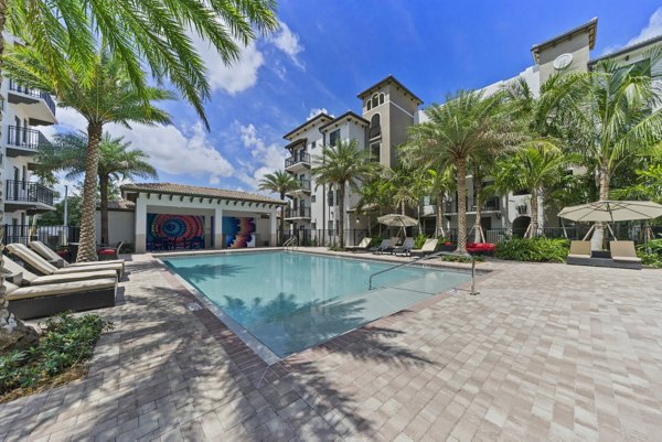 Relax by the sparkling pool at Ventura Pointe Apartments, perfect for leisure and unwinding in a serene atmosphere