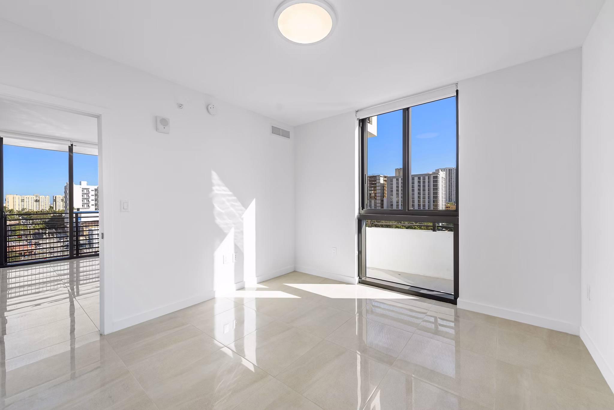 Cozy bedroom with modern decor in The Vibe Miami Apartments