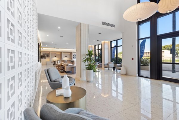 Stylish and modern clubhouse at The Vibe Miami Apartments, featuring sleek design and vibrant social spaces for residents