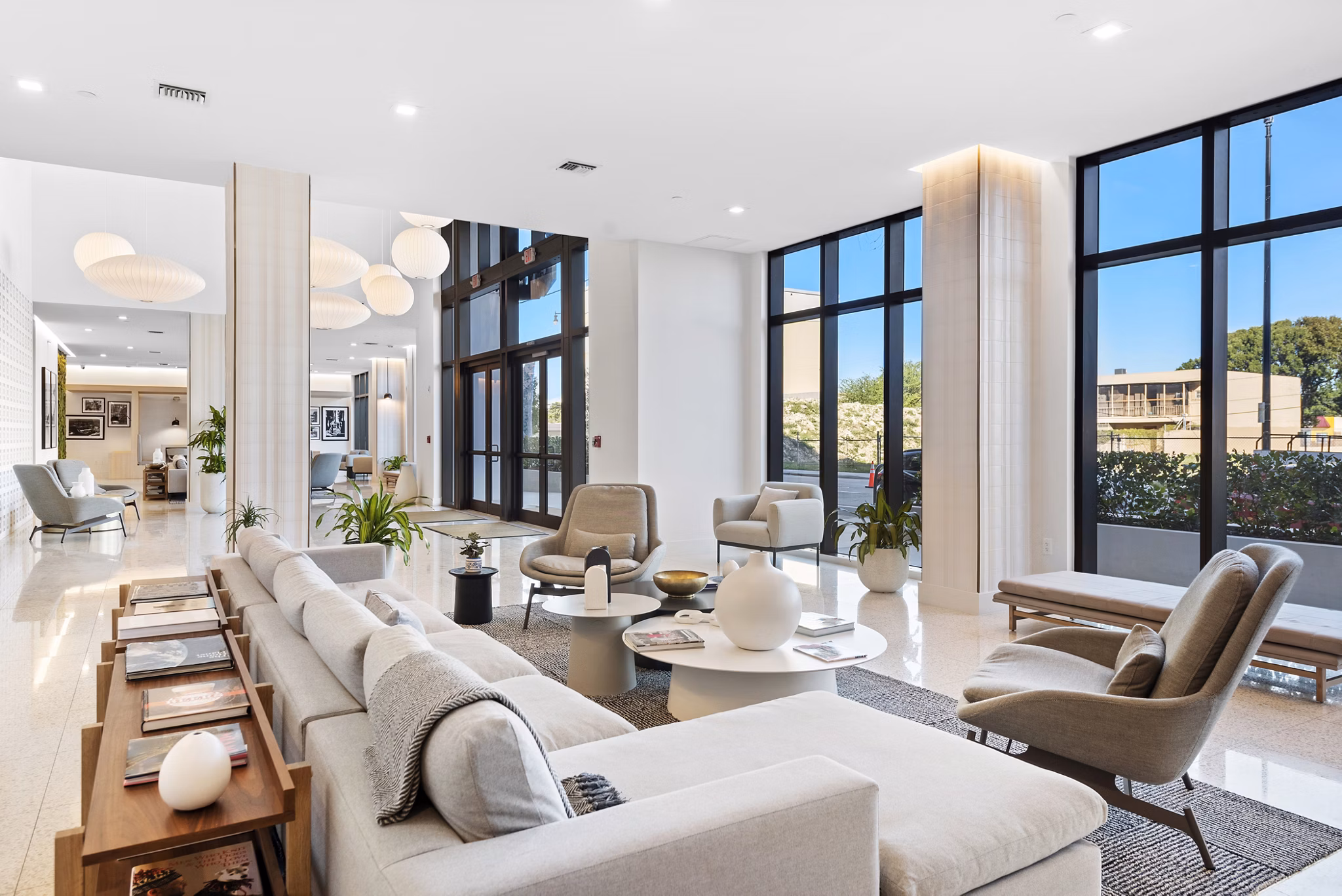 Clubhouse featuring modern decor and seating at The Vibe Miami Apartments