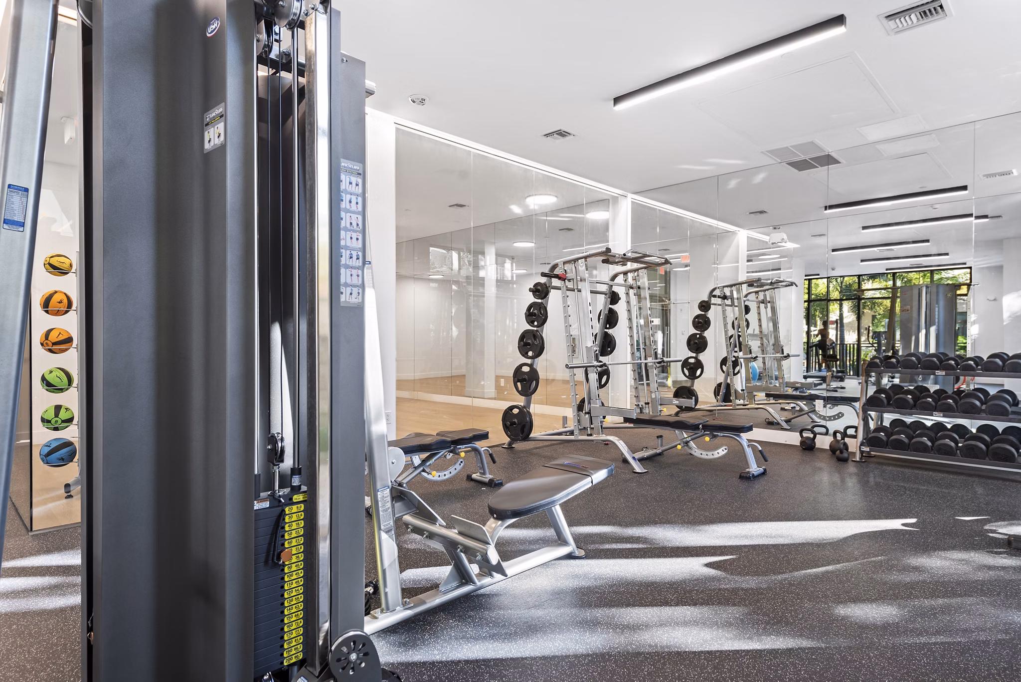 Modern fitness center featuring state-of-the-art equipment at The Vibe Miami Apartments