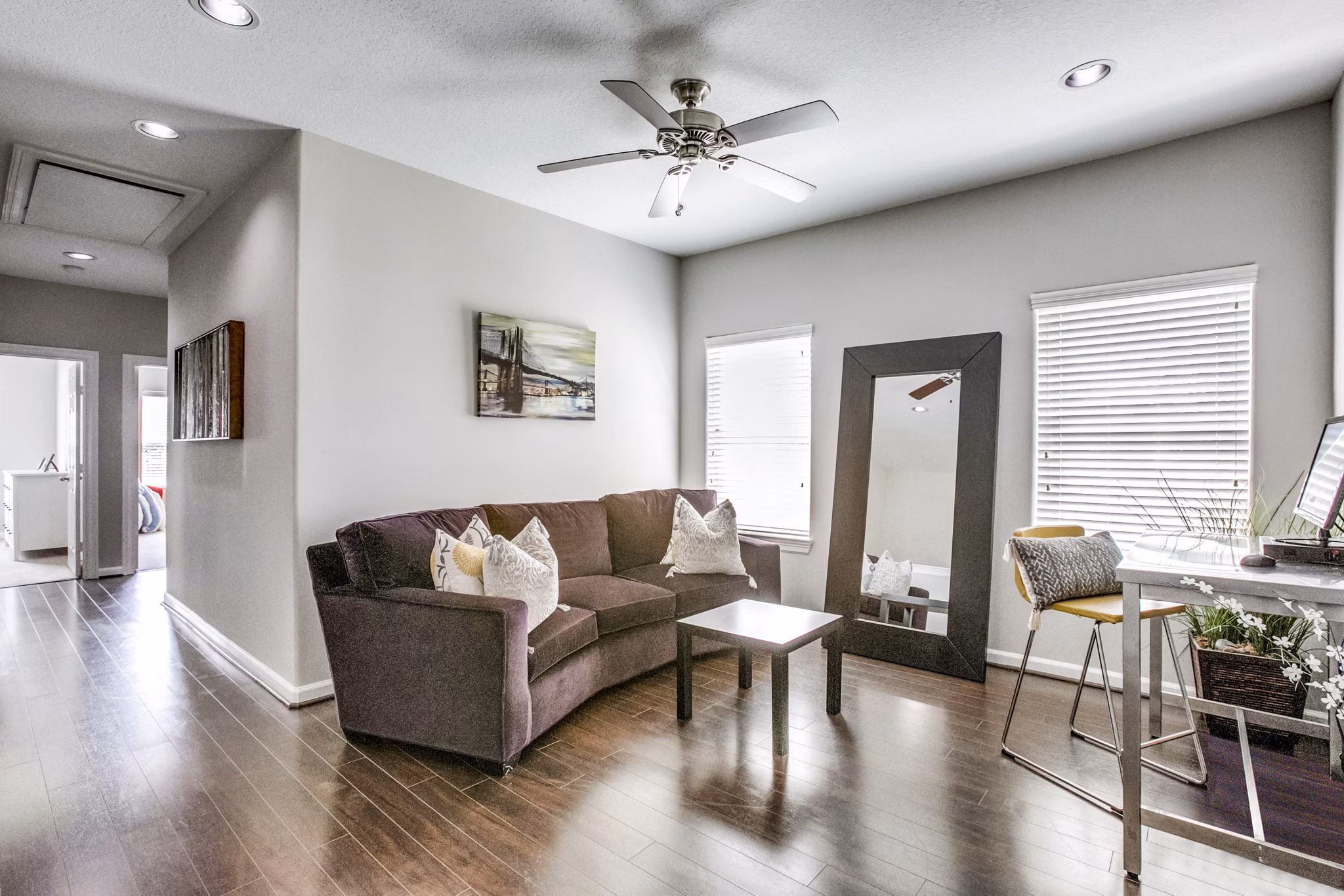 Cozy living room with modern furnishings at Addicks Stone Village Apartments