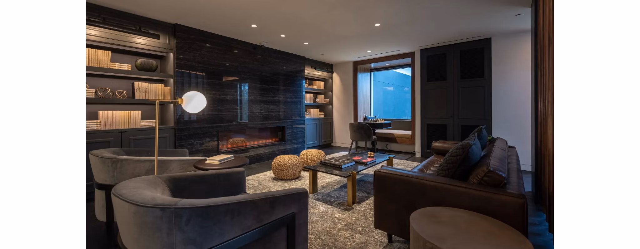 Clubhouse featuring modern design and comfortable seating at Bayou on the Bend Apartments in Houston