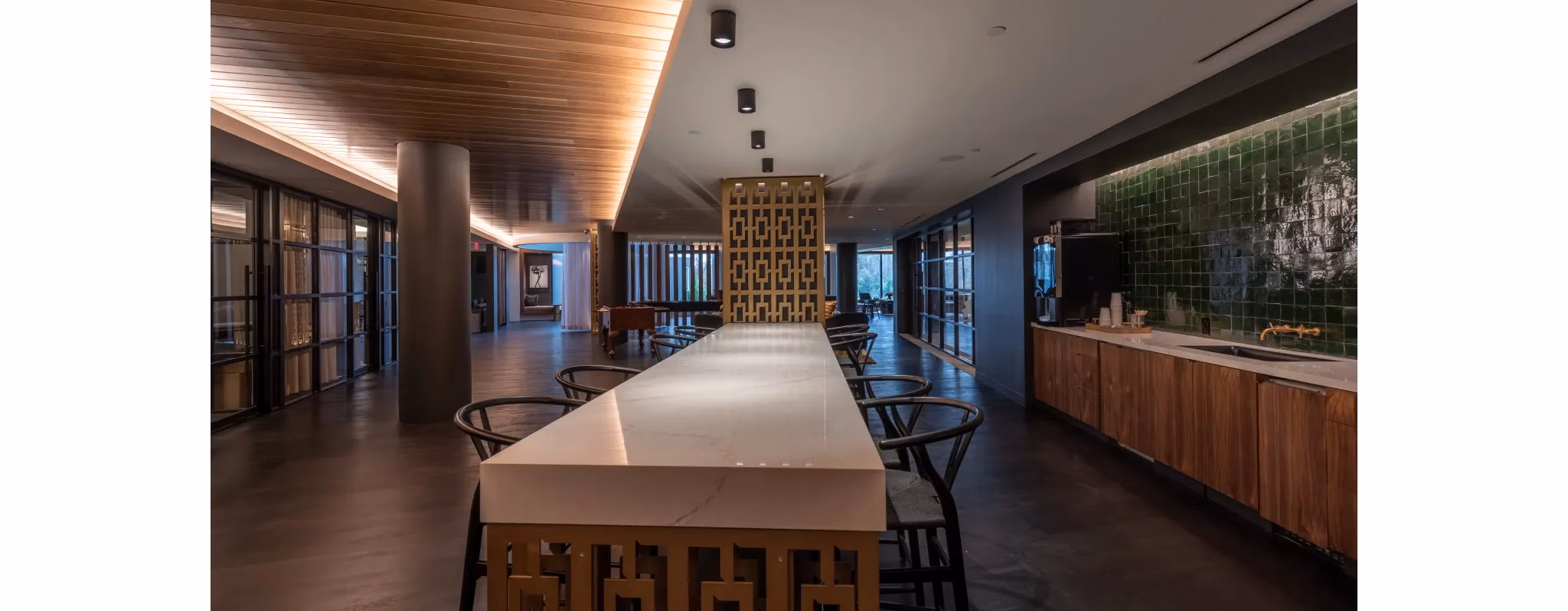 Clubhouse with modern decor and seating areas at Bayou on the Bend Apartments