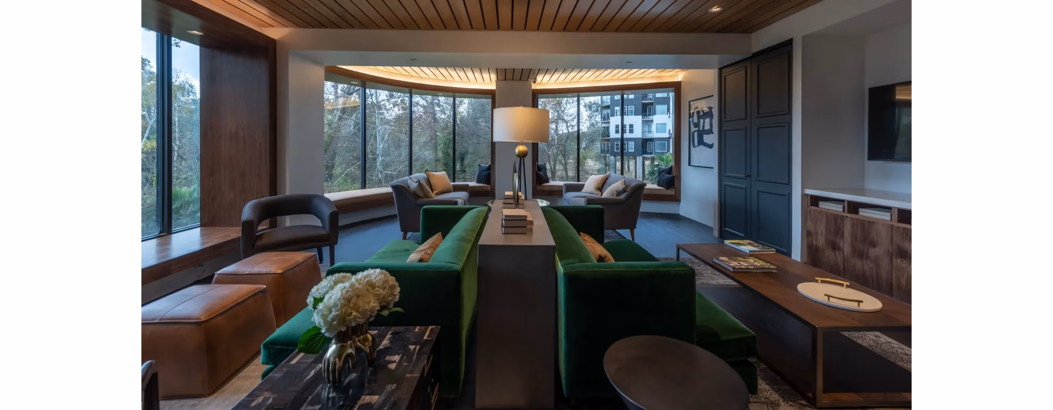 Clubhouse featuring modern design and cozy seating at Bayou on the Bend Apartments