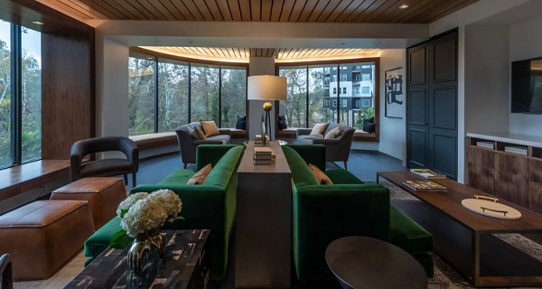 Clubhouse featuring modern design and cozy seating at Bayou on the Bend Apartments