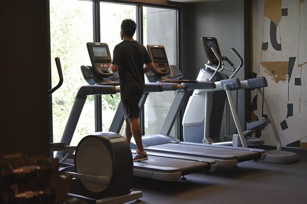 State-of-the-art fitness center with modern equipment at Bayou on the Bend Apartments