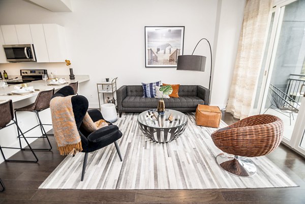 Modern living room with stylish furnishings at Bayou on the Bend Apartments