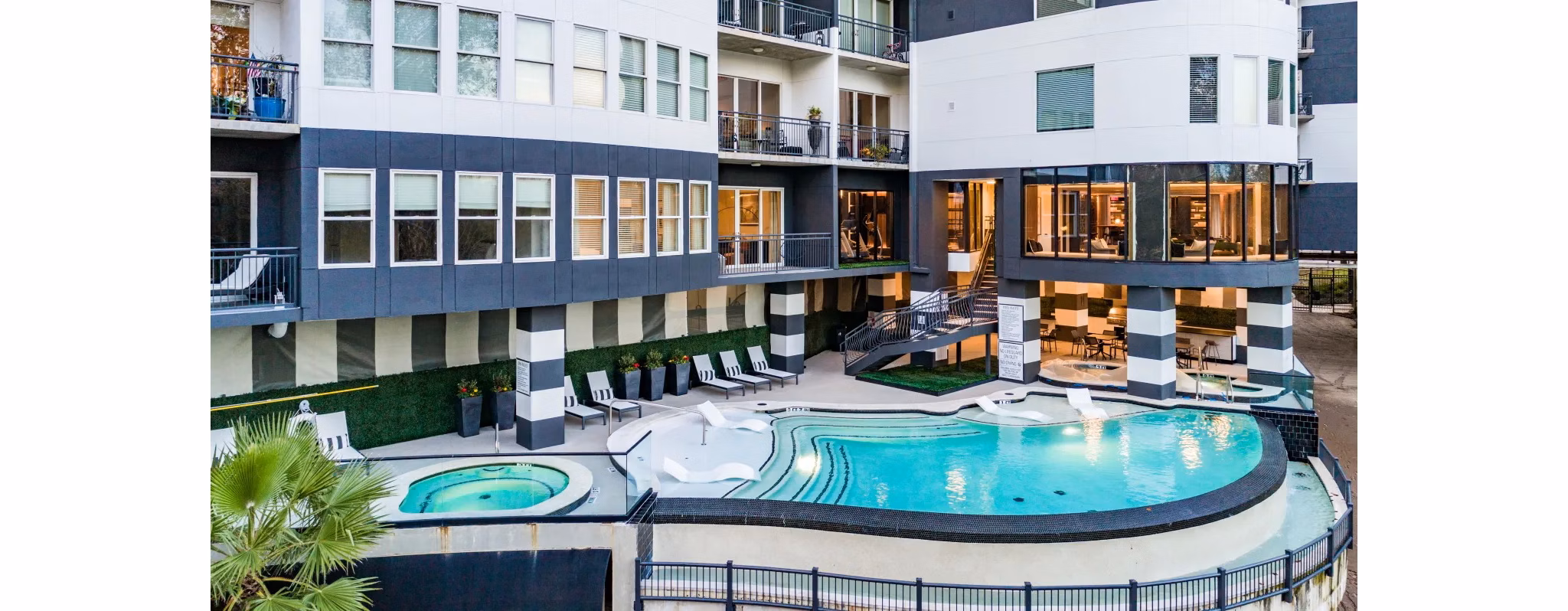 Resort-style pool at Bayou on the Bend Apartments offering luxurious relaxation and leisure activities in a serene setting