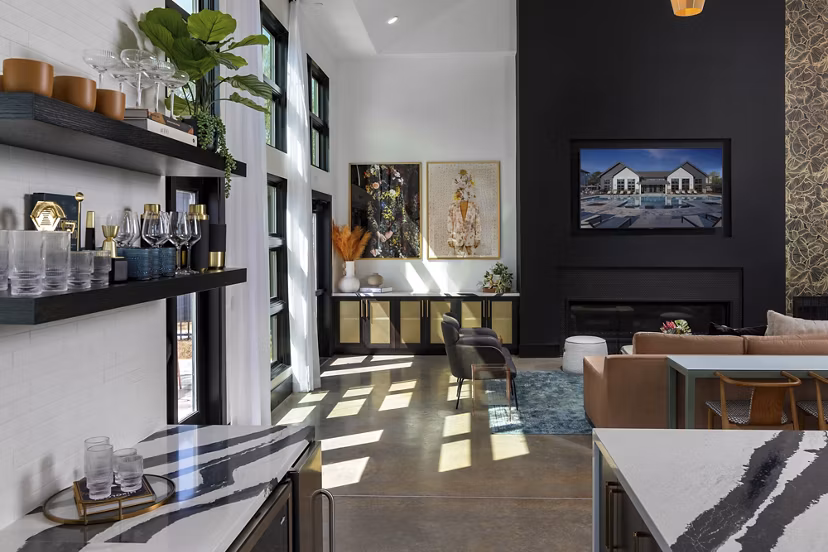 Modern clubhouse with elegant seating areas at Marlowe South Fulton Apartments, offering luxury amenities for residents
