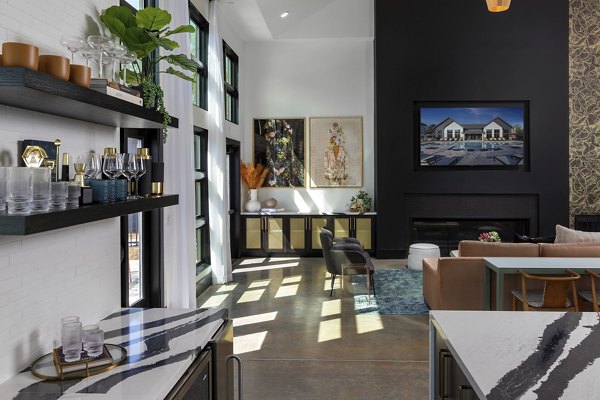 Modern clubhouse with elegant seating areas at Marlowe South Fulton Apartments, offering luxury amenities for residents