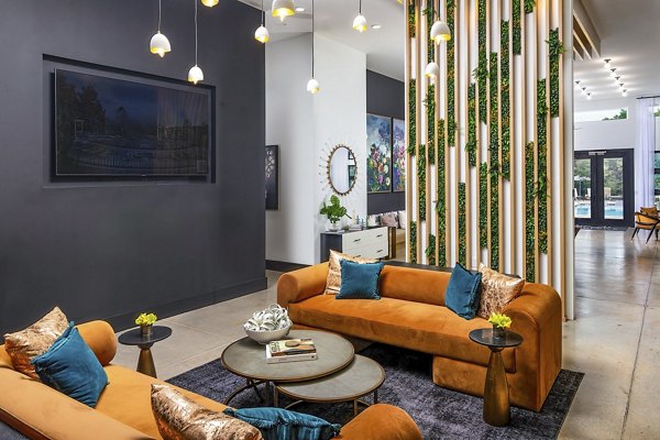 Elegant clubhouse with cozy seating and modern decor at Marlowe South Fulton Apartments