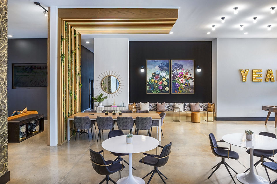 Contemporary clubhouse featuring modern dÃ©cor at Marlowe South Fulton Apartments