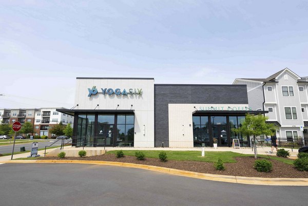 building/exterior at Cascadia at Highland Creek Apartments