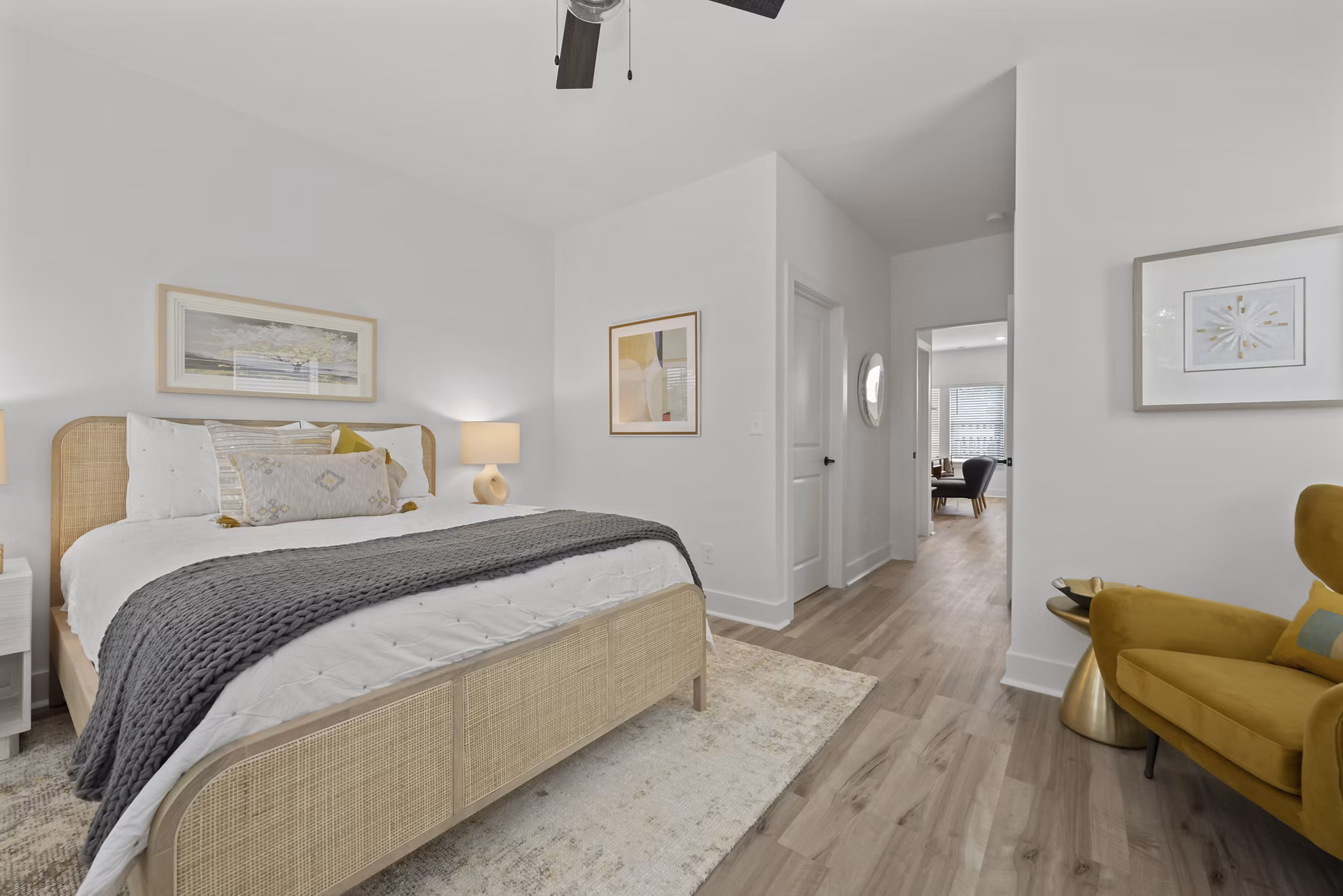 Cozy bedroom with modern furnishings at Cascadia at Highland Creek Apartments