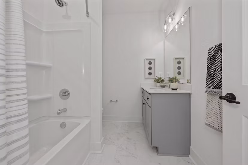 Modern bathroom with sleek fixtures at Cascadia at Highland Creek Apartments
