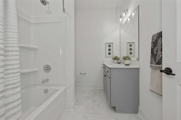 Modern bathroom with sleek fixtures at Cascadia at Highland Creek Apartments