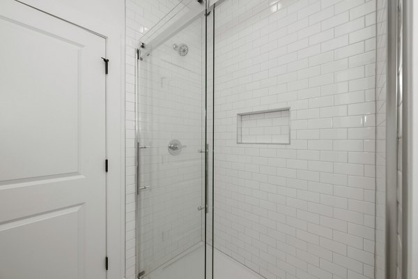 Modern bathroom with sleek fixtures at Cascadia at Highland Creek Apartments