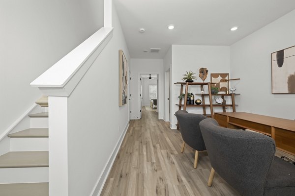 Elegant hallway with modern lighting at Cascadia at Highland Creek Apartments