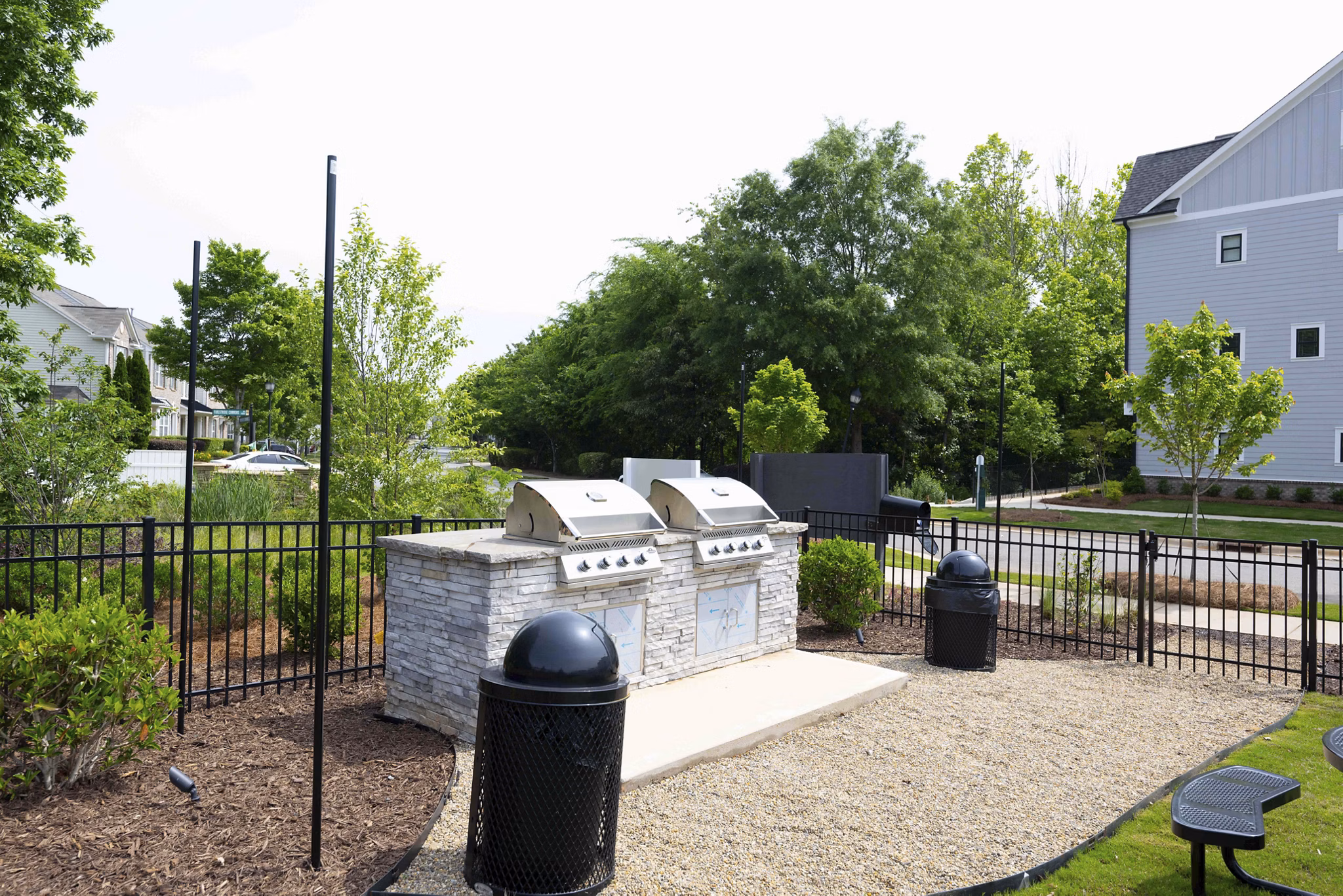 grill area at Cascadia at Highland Creek Apartments