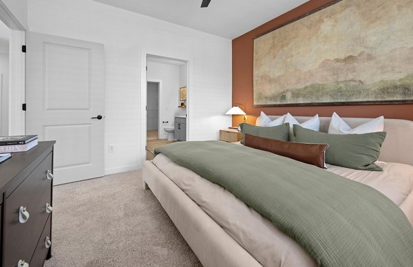 Cozy bedroom with elegant decor at Elan Prosperity Village Apartments